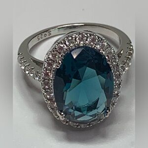 Large Oval Faceted London Blue Topaz Framed by/Cubic Zirconias w/CZ Band